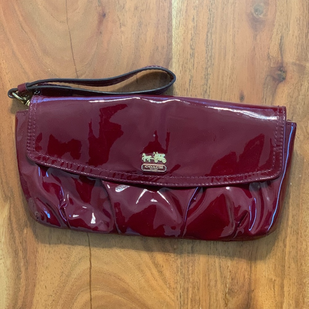 Burgundy patent leather Coach Wristlet